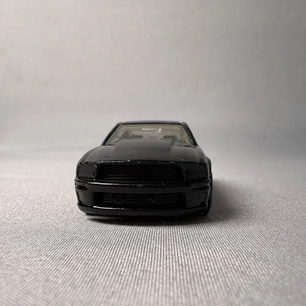 Hot Wheels 07 Ford Mustang Black with Red Stripes Diecast Car 1/64 Scale C46